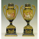 Pair of late 19th Century Vienna style porcelain two handled urn shaped vases, each having painted