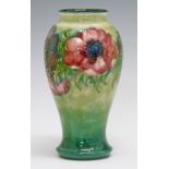 Moorcroft 'Anemone' vase of baluster form having typical stylised foliate decoration on a two tone