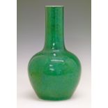 Chinese mottled green monochrome glazed vase having an ovoid body and cylindrical neck, base with