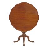 Georgian style mahogany circular snap top supper table, the top with pie-crust edge, standing on a