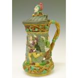 19th Century Minton majolica lidded Tower jug, the pewter mounted hinged cover having a finial