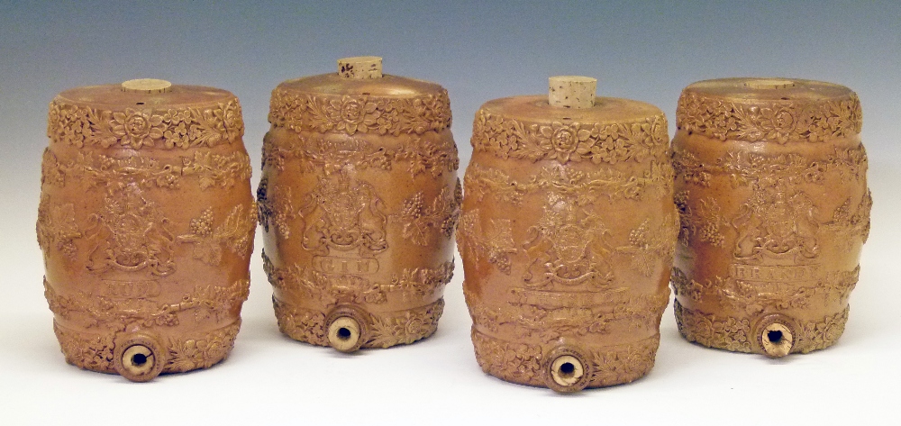 Set of four 19th Century Doulton Lambeth brown glazed stoneware spirit barrels, each having