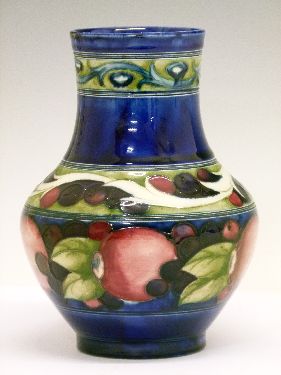 William Moorcroft baluster vase decorated with a banded Pomegranate pattern on a blue ground, base - Image 4 of 7