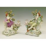 Pair of late 18th Century Derby porcelain figural candlesticks, formed as a lady and gentleman