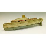 Bing tin plate 'Racer' motor boat, steam driven in cream and red, circa 1910, 47cm long