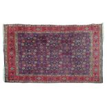 Middle Eastern rug, the central field with allover geometric decoration on a blue ground within