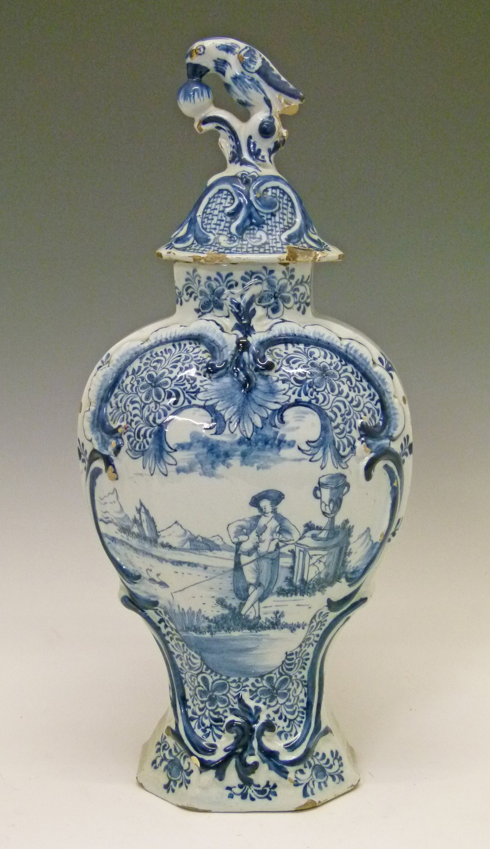 19th Century Dutch Delft baluster vase and cover having blue and white painted decoration