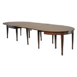 George III mahogany 'D' end extending dining table on tapered spade supports, 318cm long when