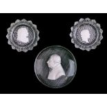 Two 19th Century French moulded glass pin dishes, each containing sulphide portraits - Voltaire &