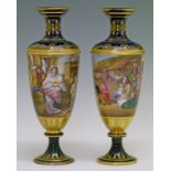 Pair of Franz Dörfl Vienna baluster vases, each having a central band with finely painted continuous