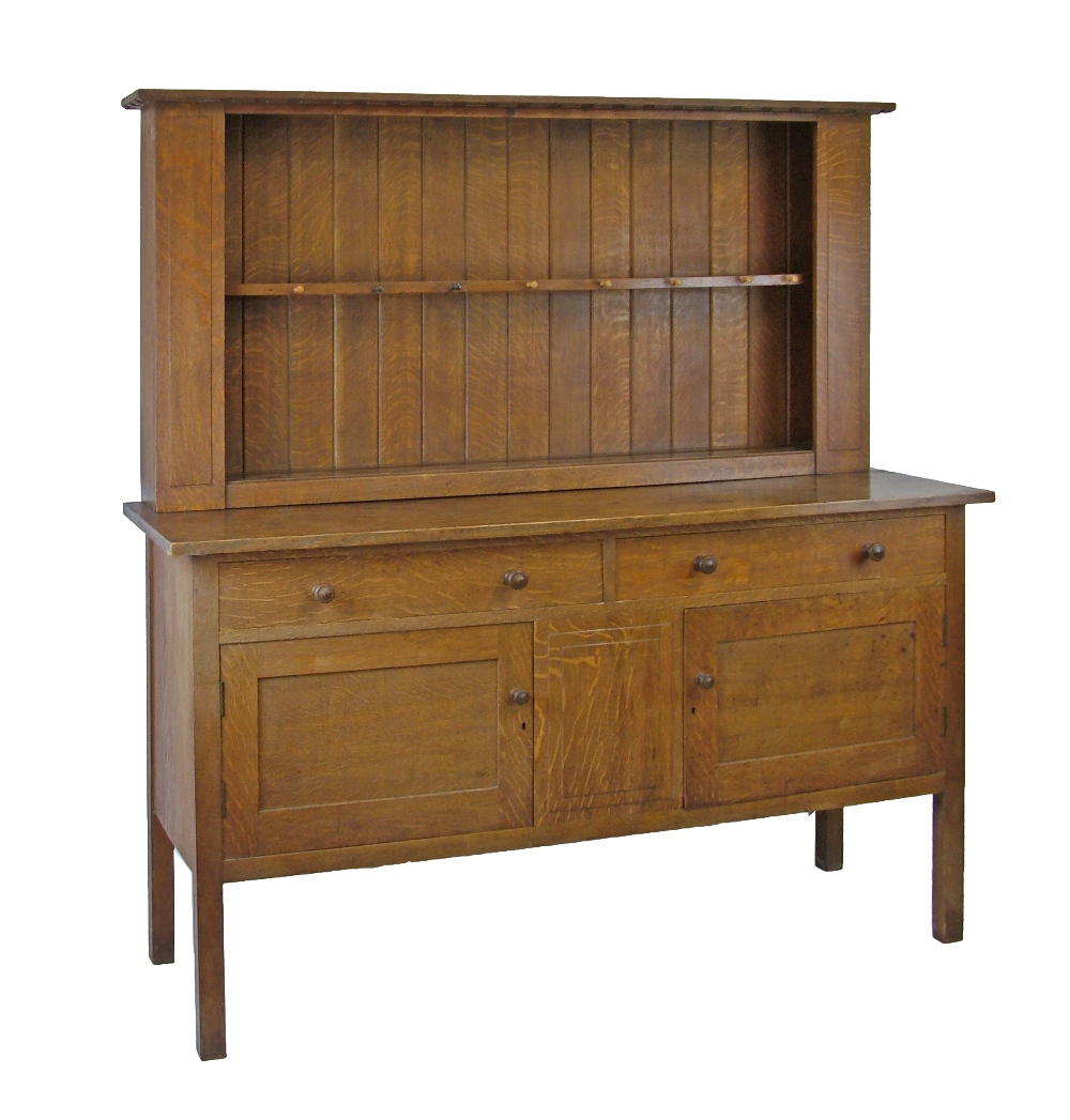 Heal & Son Ltd oak high dresser, the plate rack fitted a single open shelf, tongue-and-groove back