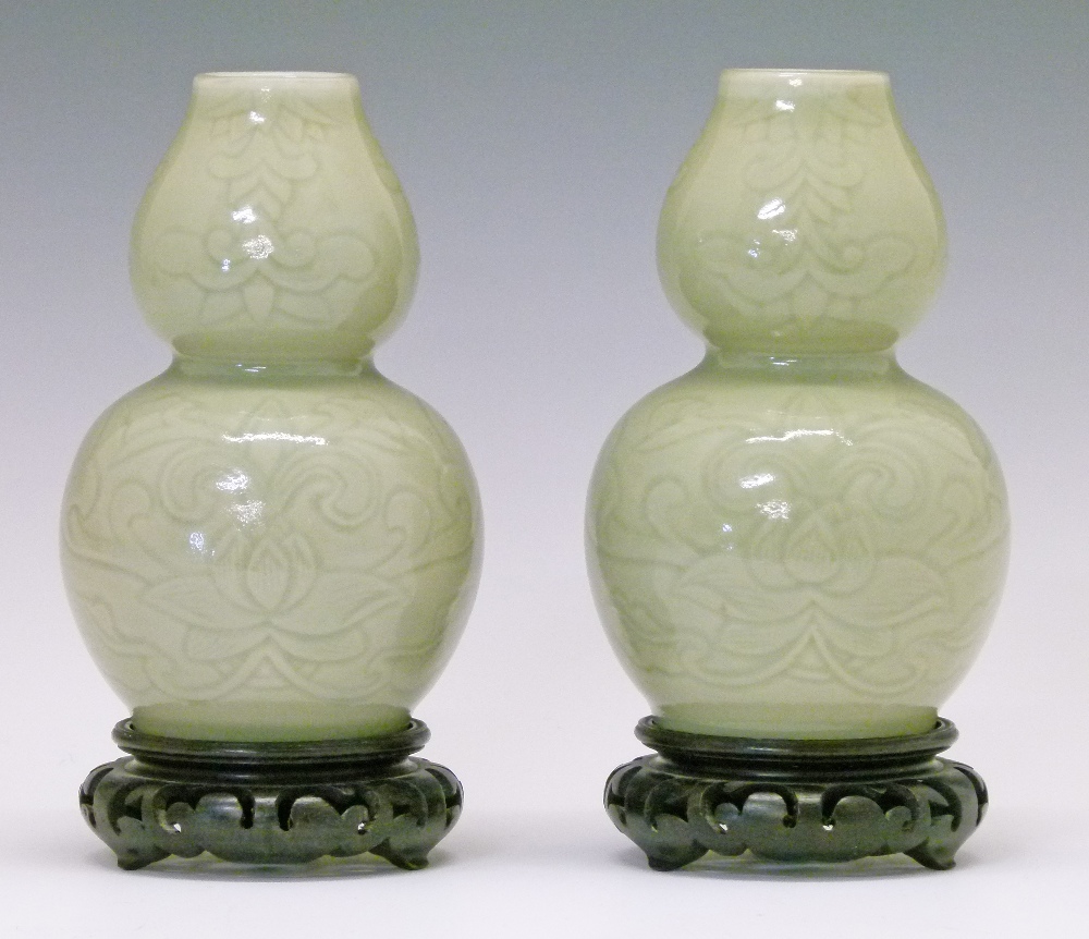 Pair of Chinese celadon glazed porcelain double gourd shaped vases, each having engraved foliate