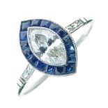 Marquise diamond and calibré sapphire cluster ring, the diamond of approximately 0.75 carats,