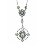 Diamond cluster pendant, the drop cluster with an old mine cut of approximately 0.35 carats enclosed