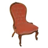 Victorian lady's carved walnut framed balloon back drawing room chair standing on cabriole supports