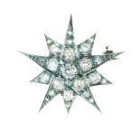 Diamond starburst brooch, the central old cut of approximately 0.15 carats, the remaining twenty-