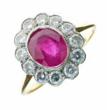 Ruby and diamond cluster ring, the oval cut measuring approximately 7mm x 5.5mm x 3.6mm deep,