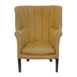 19th Century wing back porter's chair standing on mahogany square supports  Condition: Please see