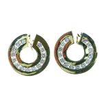 Pair of diamond earrings, of hoop design, each set with fourteen channel set brilliants, the