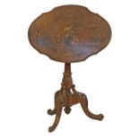 19th Century Continental figured walnut and walnut shaped oval top occasional table having inlaid