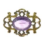 Victorian amethyst brooch, the oval cut, 2.5cmlong, to an unmarked gold scroll work frame, 5cm