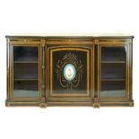 Victorian burr walnut banded ebonised credenza, the central cupboard door having an oval Sevres