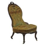 Victorian lady's carved walnut framed balloon back drawing room chair standing on carved scroll