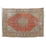 Good quality modern Middle Eastern carpet decorated with a central medallion, the red field with