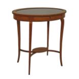 Edwardian rosewood banded satinwood oval curio table standing on tapered slender splayed supports