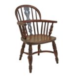 19th Century child's yew and elm low hoop back Windsor chair by G. Wilson of Grantham, standing on
