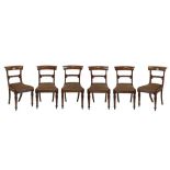 Set of six Victorian mahogany yoke back dining chairs, each having a drop-in seat and standing on