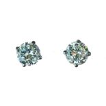 Pair of single stone diamond earstuds, the brilliant cuts of approximately 0.65 carats each, the