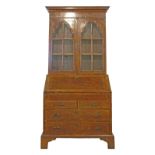 Antique Queen Anne style crossbanded figured walnut bureau bookcase, the upper section fitted