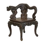 Chinese heavily carved hardwood corner chair retailed by Arthur & Bond of Yokohama, the back