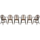 Set of six early 20th Century ash, oak and elm low hoop back open arm Windsor elbow chairs, each