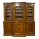 Victorian style figured walnut two section breakfront library bookcase, the upper section fitted