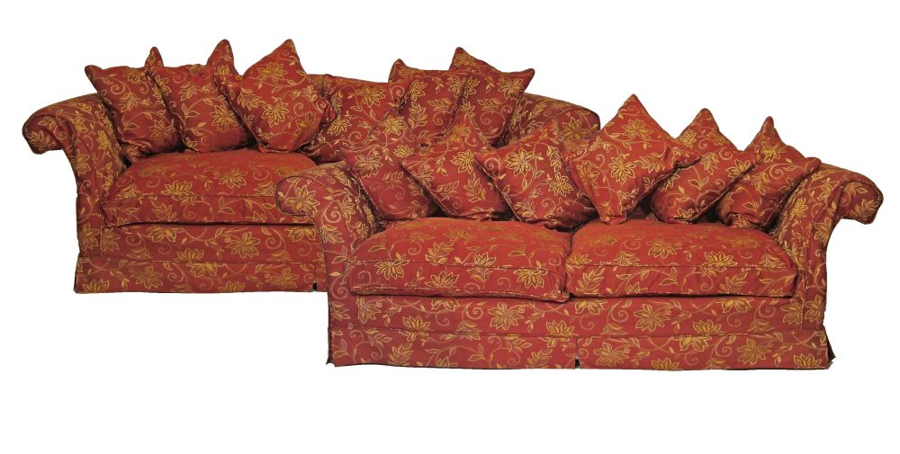 Pair of good quality modern three seater sofas, having splayed arms and with gilt stylised floral