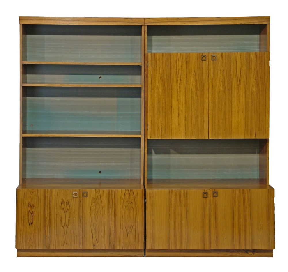 Pair of Danish style rosewood lounge display units, the first fitted four shelves, the cupboards