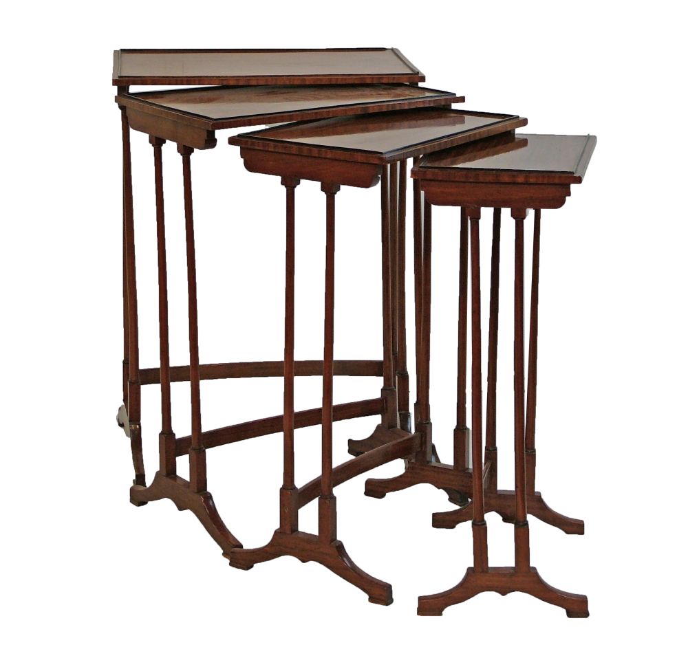 Set of Edwardian satinwood and walnut rectangular top quartetto tables, each standing on slender