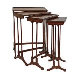 Set of Edwardian satinwood and walnut rectangular top quartetto tables, each standing on slender