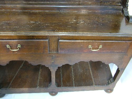 18th Century and later oak Welsh dresser, the plate rack with moulded cornice, shaped apron below - Image 3 of 7