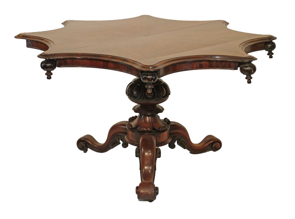 Victorian rosewood snap top centre table, the top of inverted octagonal form and standing on a