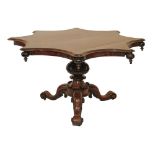 Victorian rosewood snap top centre table, the top of inverted octagonal form and standing on a