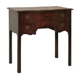 George III mahogany serpentine front kneehole serving table fitted one and two short drawers with