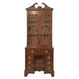 String inlaid mahogany secretaire bookcase, the upper section fitted a swan neck pediment, four