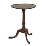 George III mahogany snap top wine table having a circular dish top and standing on a turned pillar