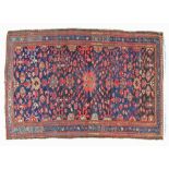 Hamadan rug having geometric and stylised decoration on a blue ground within multi borders, 217cm