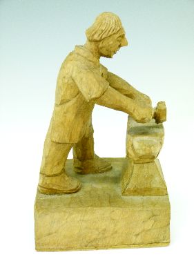 Tom 'Gnome Man' Whittaker of Littlebeck - Carved oak figure of a blacksmith, signed with a carved - Image 2 of 7