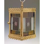 Victorian pressed brass framed hall lantern having four cut ruby and clear glass leaded panels, 29.