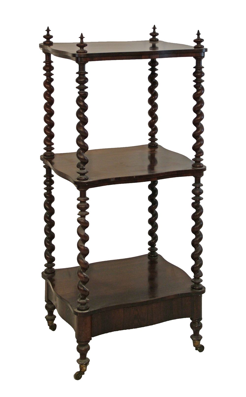 Victorian rosewood three tier what-not, the shaped shelves supported by barley twist columns, a